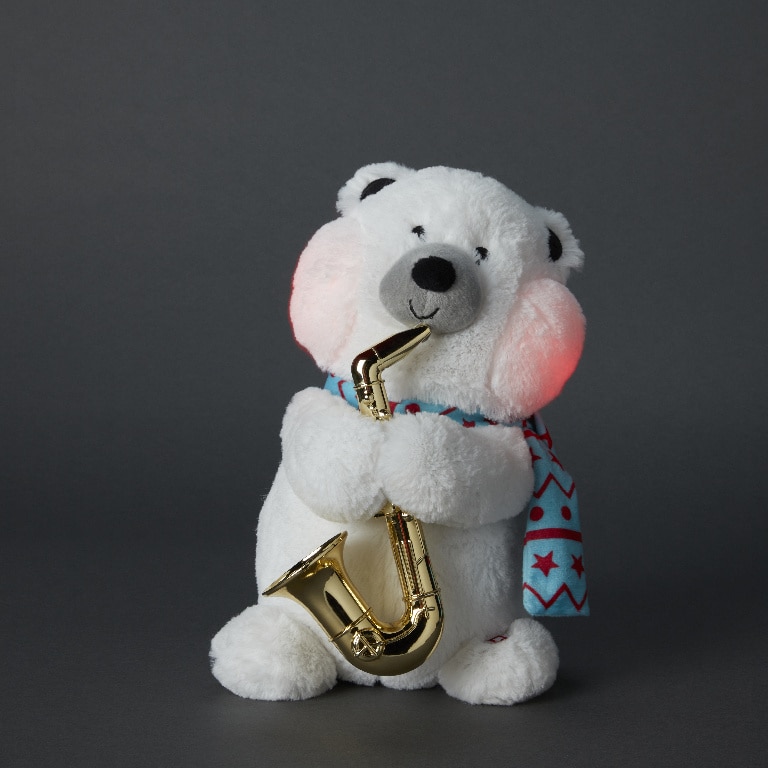 Jucarie Urs Polar cu Saxofon, 26.5 cm, se leagana si canta, pe baterie, plus, alb